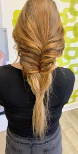 woman with large braid in hair