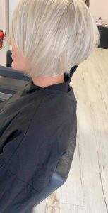 woman with short blonde pixie crop haircut