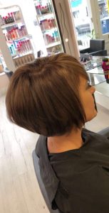 woman with short pixie crop haircut